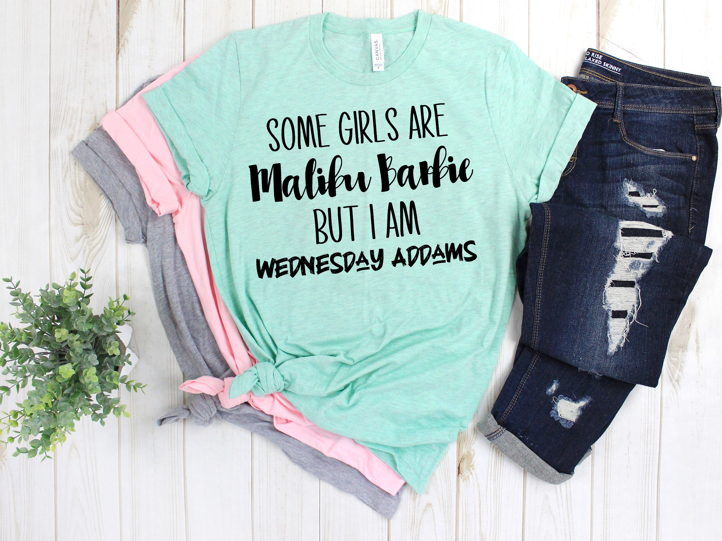 Malibu Barbie vs. Wednesday Addams Tee